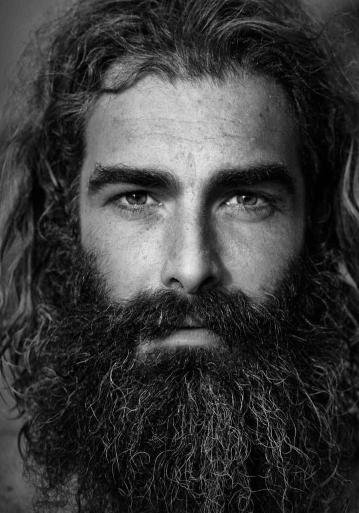 a man with long hair and a beard